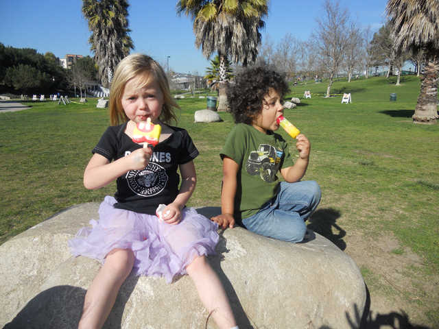Kids eating popsicles